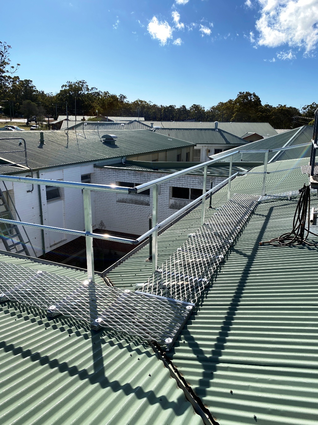 Walkway with guardrail