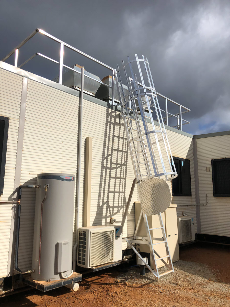 Ladder roof access with security screen door installed in WA.