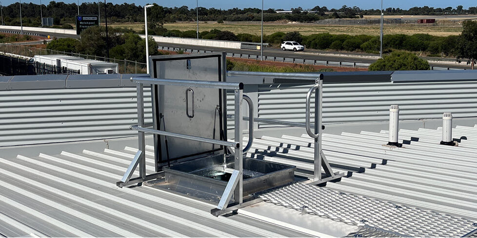 Roof access hatch installation.